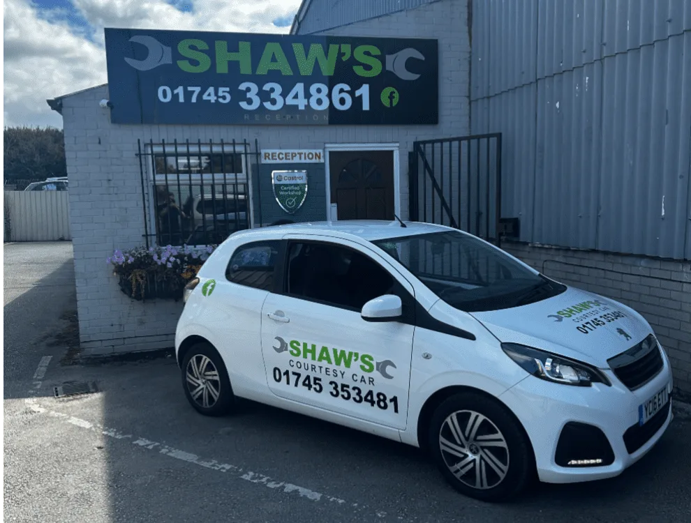 Shaw's Service Station Rhyl branch reception on Glan Y Morfa Industrial Estate, with a Shaw's courtesy car outside